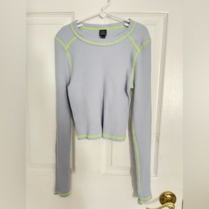 Light blue long sleeve shirt with green stitching